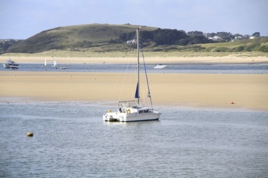 Sailing boat moored on the camel at ow tide